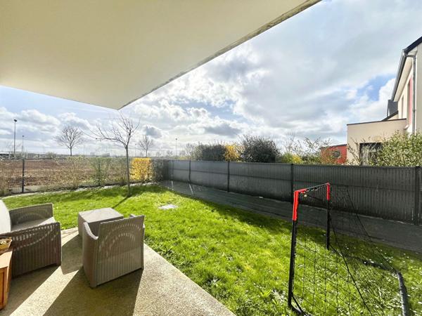 A VENDRE appartement Biéville Beuville 3 pièce(s) - vendu libre - belle orientation - jardin - terrasse - parkings