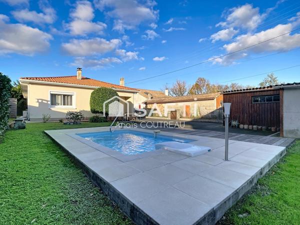 CHARMANTE MAISON DE PLAIN PIED AVEC PISCINE PROCHE DU CENTRE VILLE