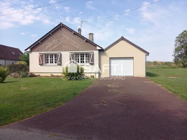 Maison avec piscine, garage et grand terrain