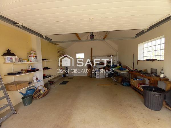 Maison avec piscine, garage et grand terrain