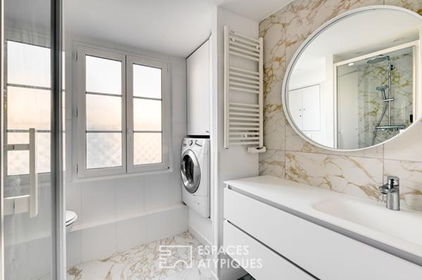 Appartement rénové avec balcon filant au coeur du Marais historique