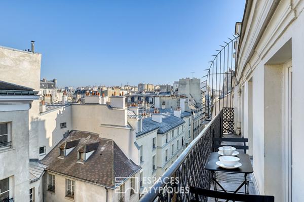 Appartement rénové avec balcon filant au coeur du Marais historique