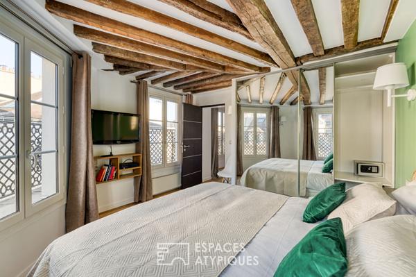 Appartement rénové avec balcon filant au coeur du Marais historique