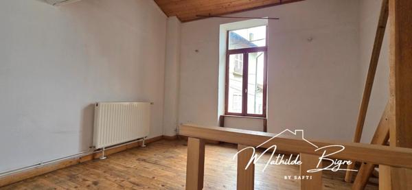 Maison citadine pratique et pleine de potentiel