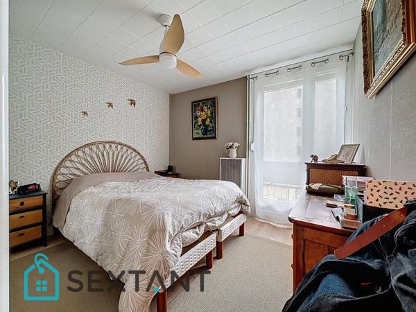 Appartement 87m2, 3 chambres et garage.