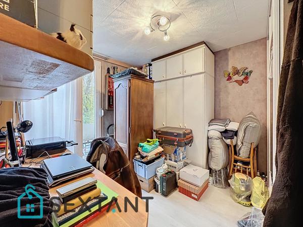 Appartement 87m2, 3 chambres et garage.