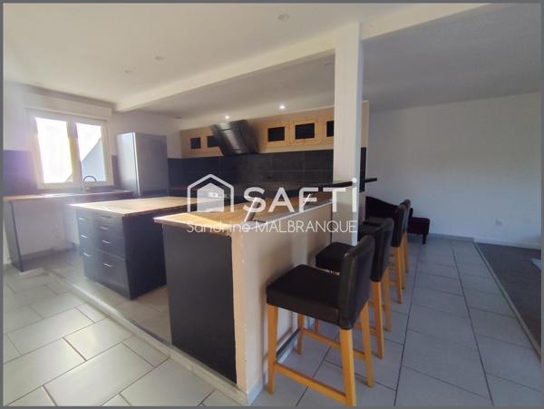 Maison individuelle , garage et jardin