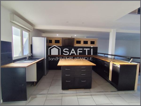 Maison individuelle , garage et jardin