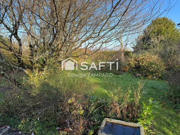 Espace de vie de plain-pied - Nichée au cœur d'un village