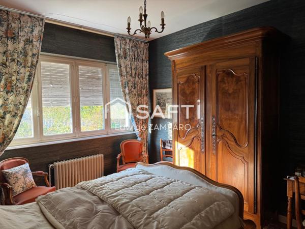 Espace de vie de plain-pied - Nichée au cœur d'un village