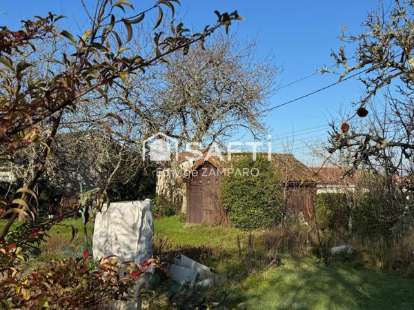 Espace de vie de plain-pied - Nichée au cœur d'un village