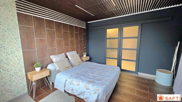 Maison d'exception de 189m², individuelle, habitable de plain pied, grand garage, terrasse, jardin