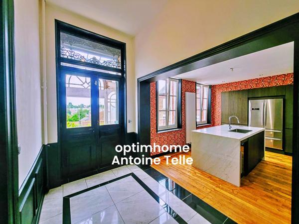 Le Cateau - Appartement en RdC avec garage, parking privatif, dépendance aménagée & jardin clos.