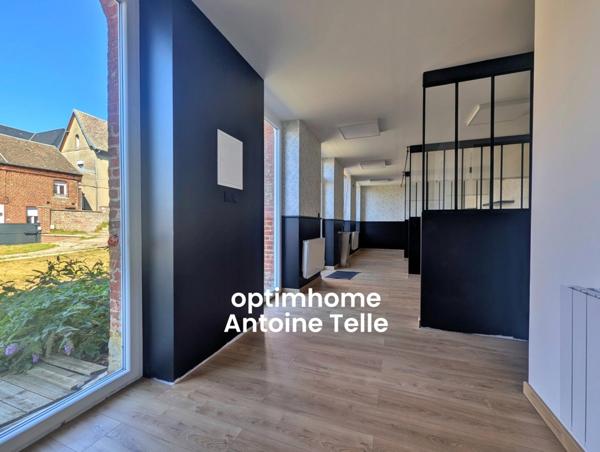 Le Cateau - Appartement en RdC avec garage, parking privatif, dépendance aménagée & jardin clos.