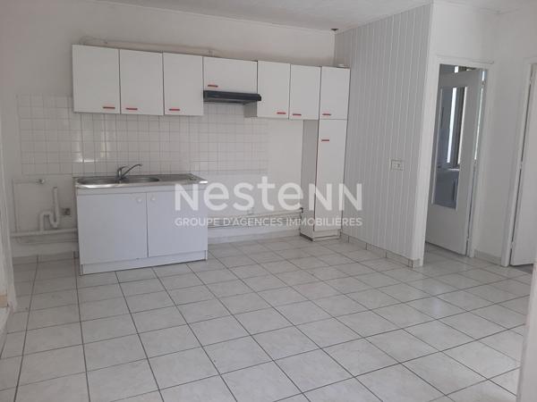 Appartement  avec garage et terrain