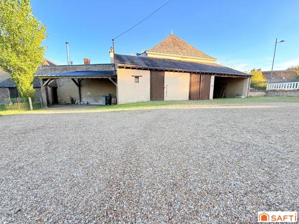 Maison de bourg avec 1290 m2 de Terrain