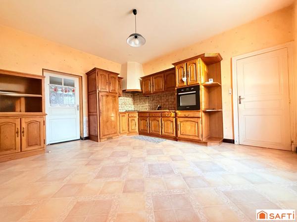 Maison de bourg avec 1290 m2 de Terrain