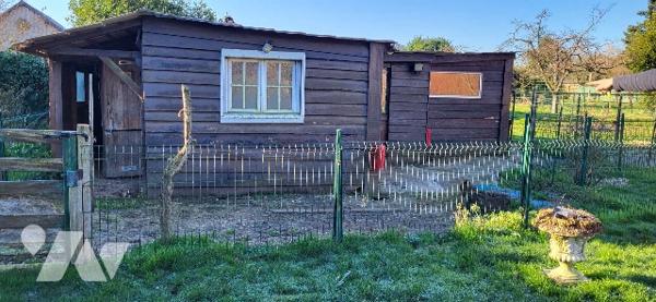 Ensemble immobilier en centre bourg avec terrain et dépendances