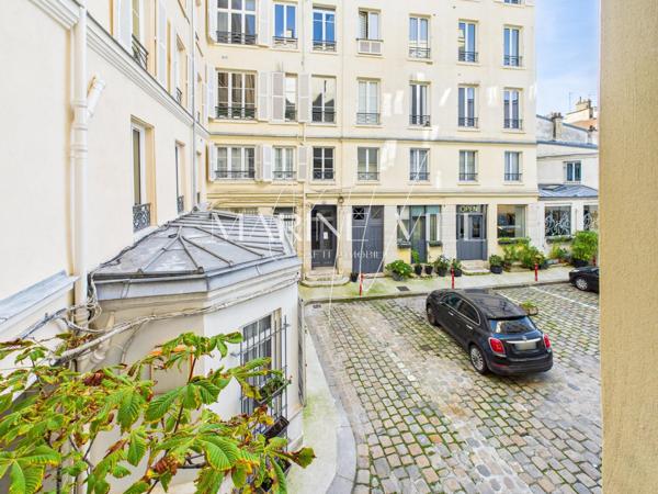 Charme authentique au cœur du Marais.