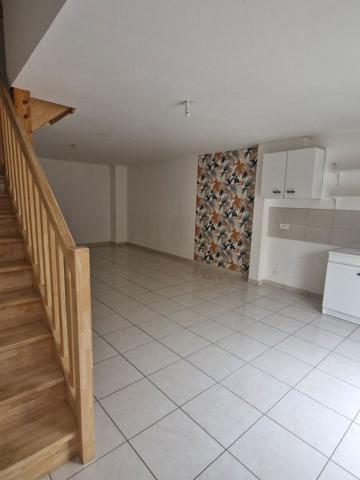 Appartement Couëron bourg 2 pièce(s) 47 m²  face Loire avec balcon, parking et garage