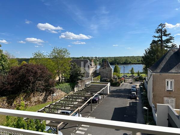 Appartement Couëron bourg 2 pièce(s) 47 m²  face Loire avec balcon, parking et garage