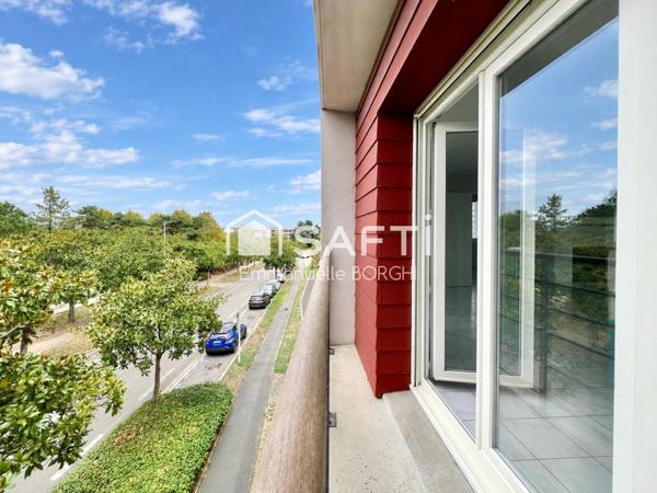 Appartement 1 chambre, balcon, stationnement privatif