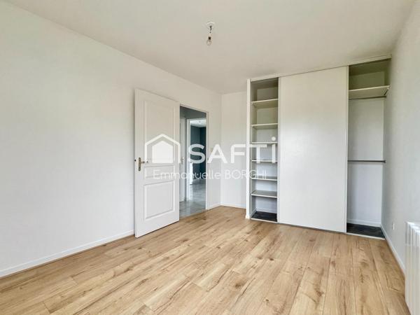 Appartement 1 chambre, balcon, stationnement privatif