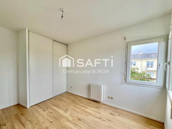 Appartement 1 chambre, balcon, stationnement privatif