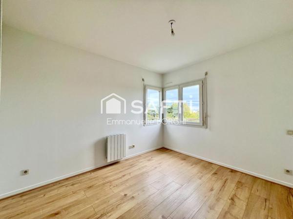 Appartement 1 chambre, balcon, stationnement privatif