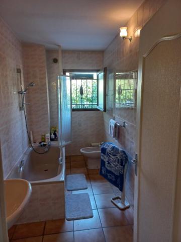 Vrai potentiel pour cette maison de ville et son jardin