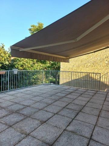 Vrai potentiel pour cette maison de ville et son jardin