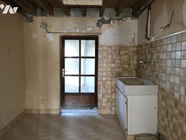 SAINT MARTIN DES BESACES : Maison mitoyenne