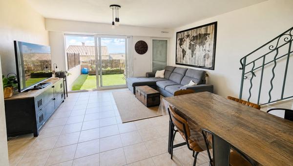 Maison mitoyenne 3P, terrasse, parking et Garage  dans Résidence sécurisée