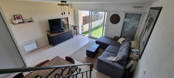 Maison mitoyenne 3P, terrasse, parking et Garage  dans Résidence sécurisée