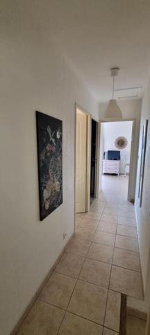 Maison mitoyenne 3P, terrasse, parking et Garage  dans Résidence sécurisée