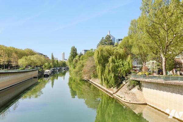 NEUILLY SUR SEINE - ILE DE LA JATTE - 5 PIECES AVEC BALCON/TERRASSE. ETAGE ELEVE.
