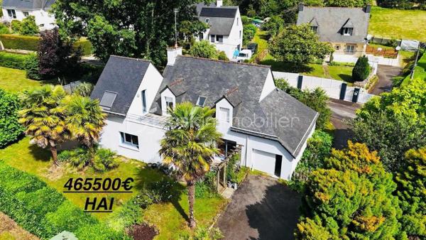 ''Exclusivité''
Maison COUP DE COEUR d'environ 150 M² Habitable. 
Située en toute proximité du secteur Le SAINDO/SALARUN sur la commune de THEIX-NOYALO  ( Nord-Est de Vannes ) et à 10 Minutes du centre ville de Vannes , cette maison d'architecte datant
de 1991 vous surprendra par son aspect et le charme qu'elle dégage.
Lotissement Résidentiel avec peu de passage.
Un extension à également été réalisée en 2004.
Un terrain entièrement clos et agréable d'environ 1000 M² avec son jardin bucolique équipé d'un petit bassin.
Maison avec orientation SUD.
Ce bien se compose sur la partie RDC d'un garage avec une pièce buanderie et d'une cave d'environ 7M² en sous-sol.
Une cuisine ouverte sur un Séjour/Salle à manger équipée d'une cheminée à insert.
Une chambre avec salle d'eau et un WC individuel.
L'extension 2004 vous propose un salon TV avec salle à manger.
Sur la partie supérieure de cette extension , Une chambre avec salle d'eau et WC pouvant accueillir vos amis et donnant sur un balcon extérieur.
A l'étage de ce bien , Quatre chambres , une salle de bain et un WC individuel.
Chauffage au sol GAZ.
Classement Energétique C.
Raccordement tout à l'égout.
Information complémentaire , ce bien pouvant être séparé en deux parties après quelques modifications dans le cadre d'une location Airbnb ou Autres permettant des revenus complémentaires ou la possibilité
de loger de la famille.