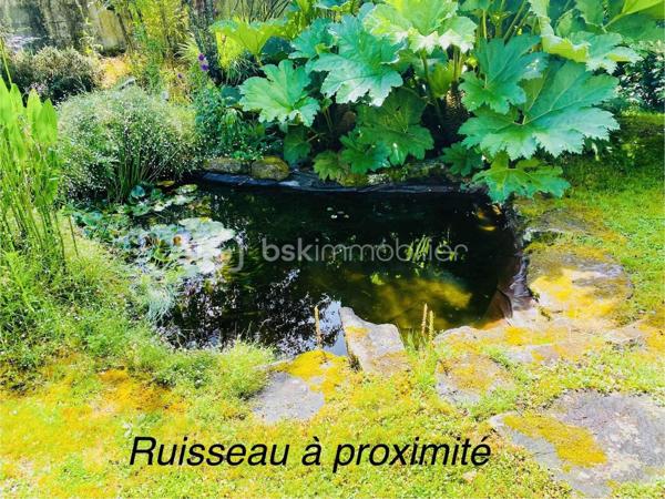 ''Exclusivité''
Maison COUP DE COEUR d'environ 150 M² Habitable. 
Située en toute proximité du secteur Le SAINDO/SALARUN sur la commune de THEIX-NOYALO  ( Nord-Est de Vannes ) et à 10 Minutes du centre ville de Vannes , cette maison d'architecte datant
de 1991 vous surprendra par son aspect et le charme qu'elle dégage.
Lotissement Résidentiel avec peu de passage.
Un extension à également été réalisée en 2004.
Un terrain entièrement clos et agréable d'environ 1000 M² avec son jardin bucolique équipé d'un petit bassin.
Maison avec orientation SUD.
Ce bien se compose sur la partie RDC d'un garage avec une pièce buanderie et d'une cave d'environ 7M² en sous-sol.
Une cuisine ouverte sur un Séjour/Salle à manger équipée d'une cheminée à insert.
Une chambre avec salle d'eau et un WC individuel.
L'extension 2004 vous propose un salon TV avec salle à manger.
Sur la partie supérieure de cette extension , Une chambre avec salle d'eau et WC pouvant accueillir vos amis et donnant sur un balcon extérieur.
A l'étage de ce bien , Quatre chambres , une salle de bain et un WC individuel.
Chauffage au sol GAZ.
Classement Energétique C.
Raccordement tout à l'égout.
Information complémentaire , ce bien pouvant être séparé en deux parties après quelques modifications dans le cadre d'une location Airbnb ou Autres permettant des revenus complémentaires ou la possibilité
de loger de la famille.