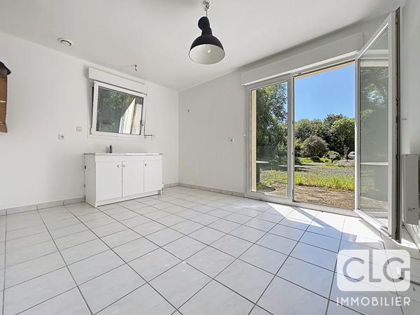 POULDREUZIC - Appartement T3 avec terrasse, jardin et parking
