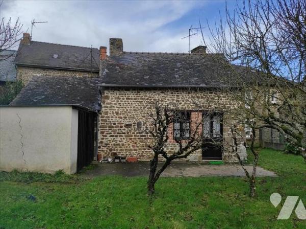 A vendre à Cigné(53), une maison en pierres comprenant une entrée, une cuisine(13.64 m²), salle...