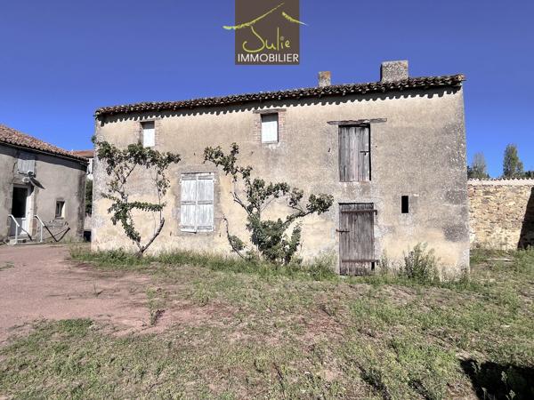 Ensemble Immobilier avec maison, ancienne habitation à rénover et sur 1972m² en partie constructible !