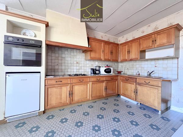 Ensemble Immobilier avec maison, ancienne habitation à rénover et sur 1972m² en partie constructible !