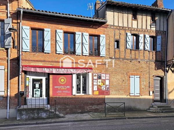 Immeuble avec local commercial loué