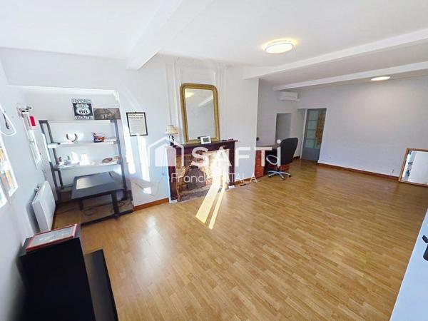 Immeuble avec local commercial loué