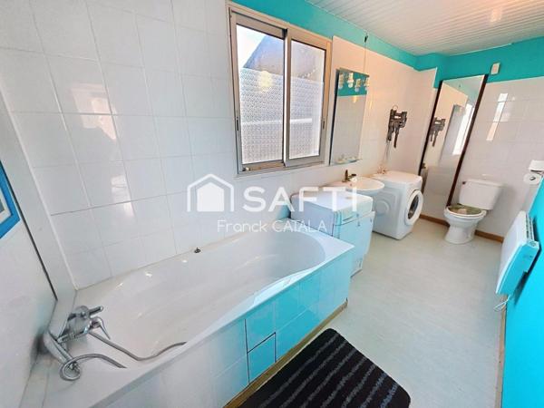 Immeuble avec local commercial loué