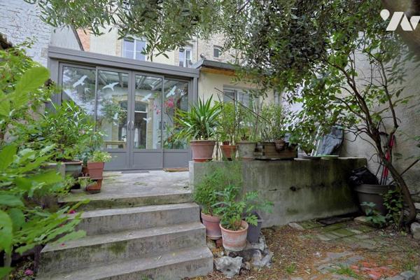 Maison 7 pièces avec jardin 