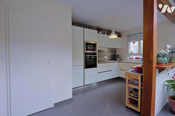 Maison 7 pièces avec jardin 