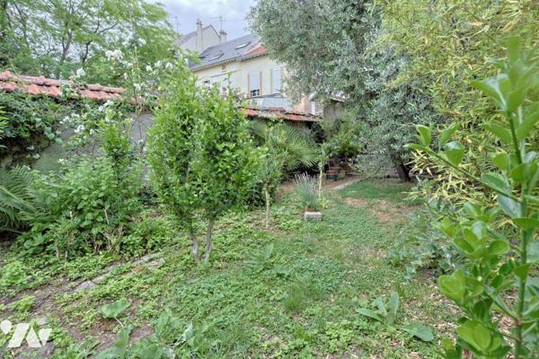 Maison 7 pièces avec jardin 