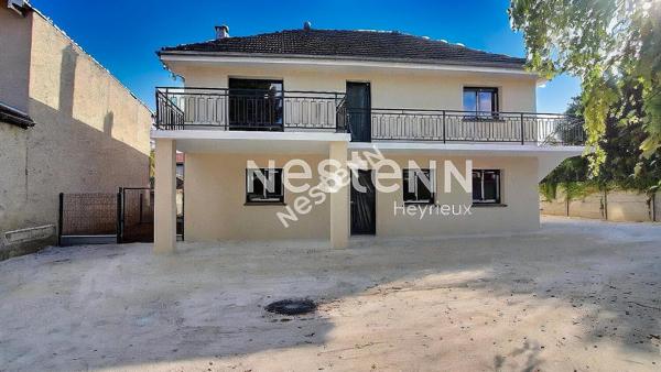 Centre village- Appartement 2 chambres- Balcon- Stationnement