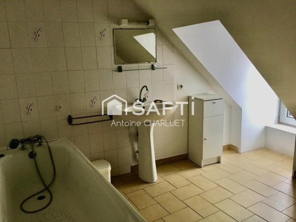 Local commercial + Appartement en plein coeur de ville